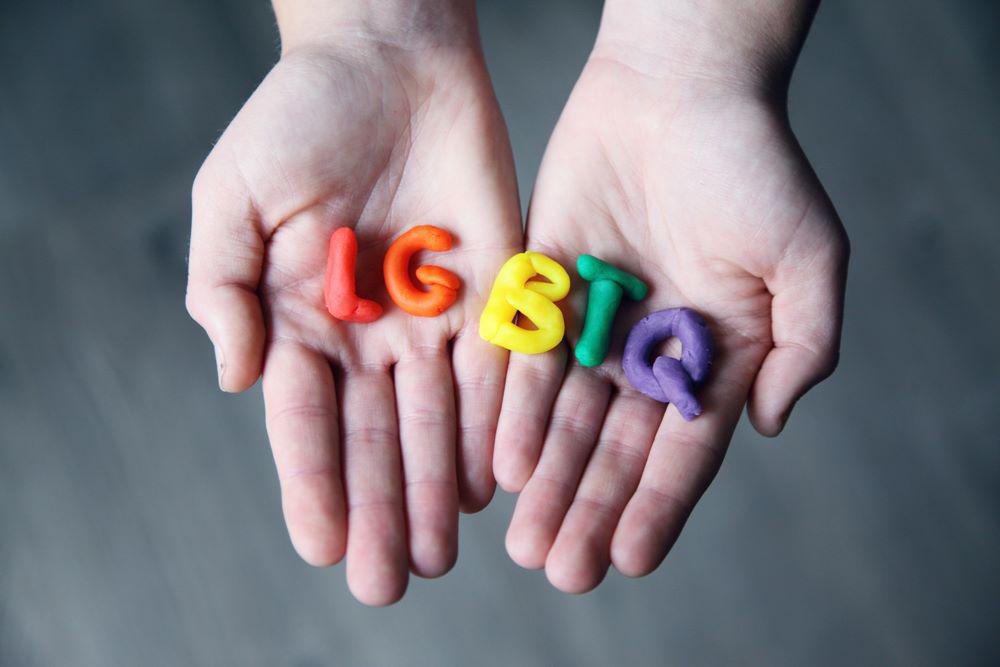 close-up-photo-of-lgbtq-letters-on-a-person-s-hands-1566842.jpg