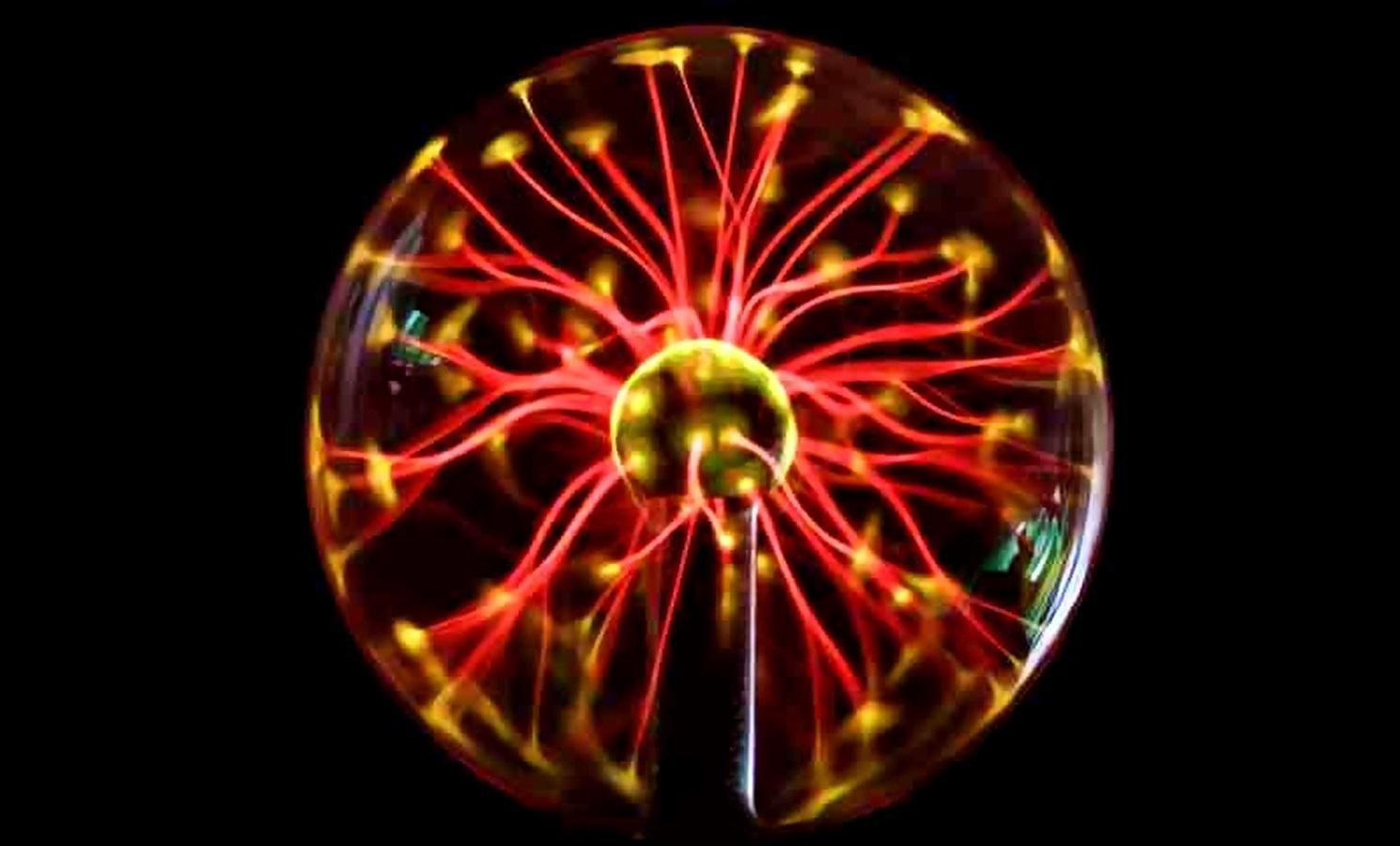 colorful plasma lamp experiment on a black background